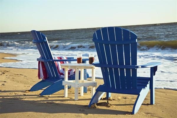 Amish Blue Poly Adirondack Chairs and White Round Side Table Set Overlooking the Ocean at the Beach