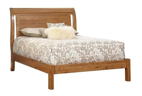 Amish Arizona Sleigh Bed with Low Footboard shown in Rustic Cherry with Autumn Wheat