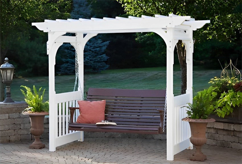 Bench swing hanging from a structure called an arbor.