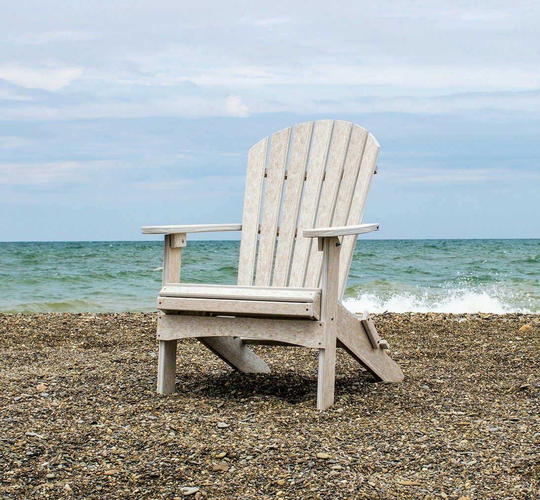 Berlin Gardens Folding Poly Adirondack Chair from DutchCrafters Amish